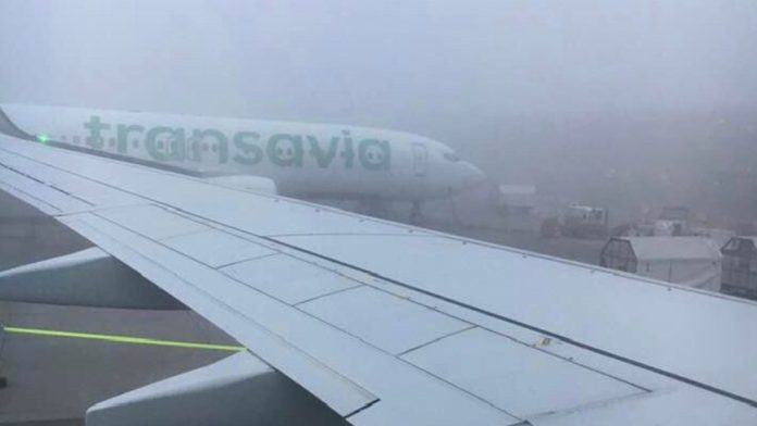 Planes, airport, fog