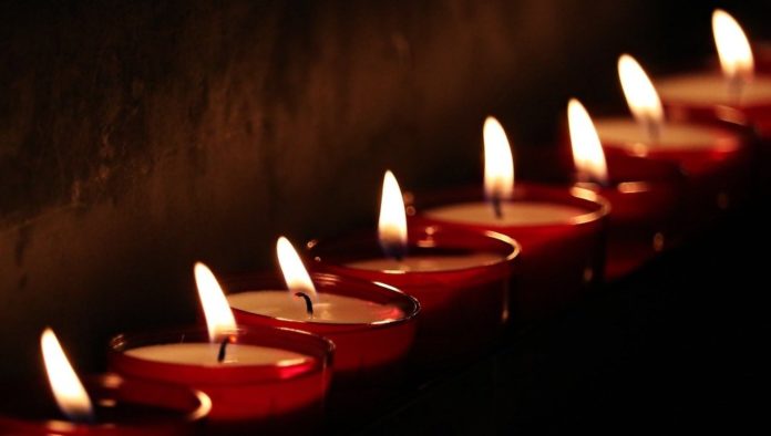 Candles lit of war graves