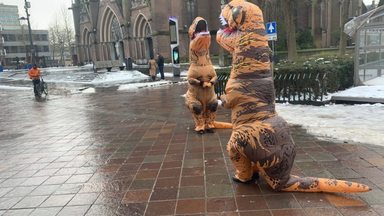 Two dinosaurs bring a bit of Carnaval to the city centre after all