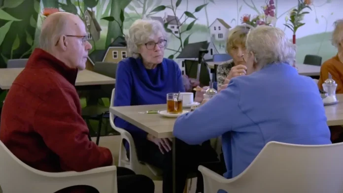 elderly sitting together